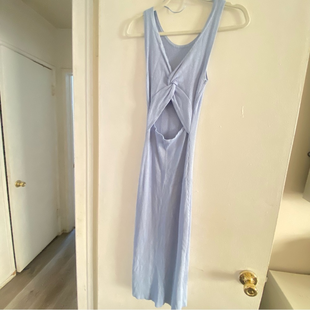 Stretchy long Maci dress with no sleeves and open cut out in the front center